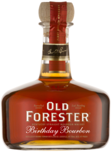 A bottle of Old Forester 2012 Birthday Bourbon on a black background.