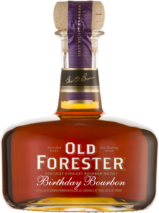 A bottle of Old Forester 2013 Birthday Bourbon on a black background.